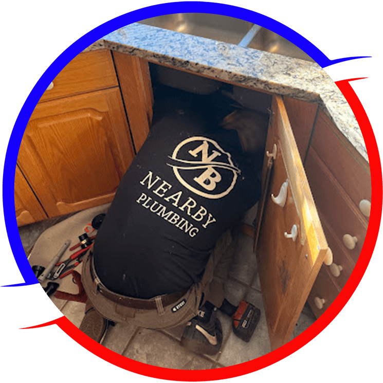A Nearby Plumbing plumber repairing a kitchen sink